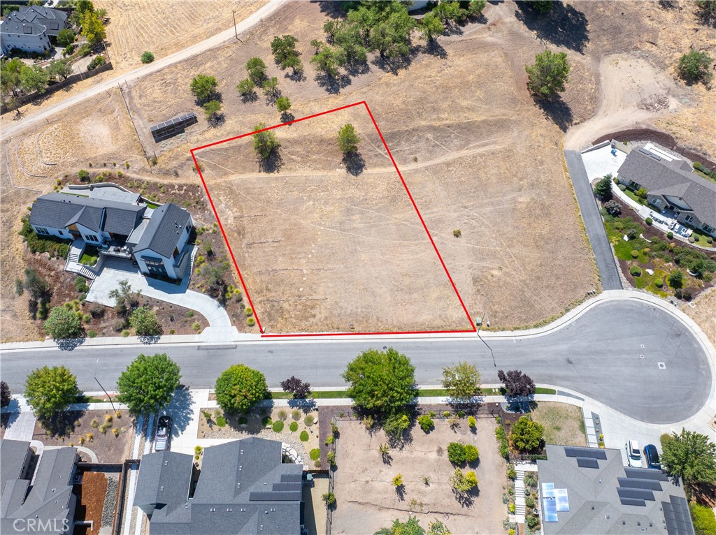 Bring your dream residence to life in the heart of Paso Robles wine country. Ideally located on the westside, this nearly half-acre parcel (approx. 20,586 sq. ft.) sits in a prestigious neighborhood of custom homes, just minutes from downtown and world-class wineries.
This offering includes design renderings by Catch Architecture, a Geological Engineering Report from Beacon Geological, and a survey and topographic map by MBS. These resources will streamline the path from concept to completion. With underground city utilities in place, this property offers a layer of safety and reliability as well as more aesthetically pleasing. This parcel is the perfect canvas for a wine country retreat, legacy home, or refined sanctuary.