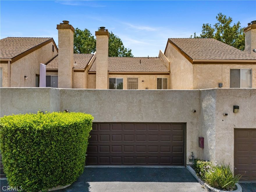 Welcome to Desert Hills – A Gated Lancaster Gem!
Step inside this beautifully remodeled two story townhome and experience style, comfort, and convenience all in one. New Stainless Steel Appliances, The upgraded kitchen shines with granite countertops, crown molding, and sleek recessed lighting. The living room continues the elegant feel with crown molding and a cozy tile wood-burning fireplace with built in surround sound - perfect for relaxing evenings. 2 car attached garage. Full Size Washer and Dryer Hook Ups.

Both bedrooms and bathrooms have been tastefully remodeled, including a chic half-bath downstairs. Sunlight pours in, highlighting the rich wood floors, elegant tile, and plush carpet throughout.

Desert Hills offers an unbeatable lifestyle with a pool, spa, tennis court, and 7-day security. Plus, you’re just a short stroll to Stater Bros, Walmart, shops, and dining. HOA covers water and trash, making it even more effortless to enjoy.

This one won’t last—come see it today!