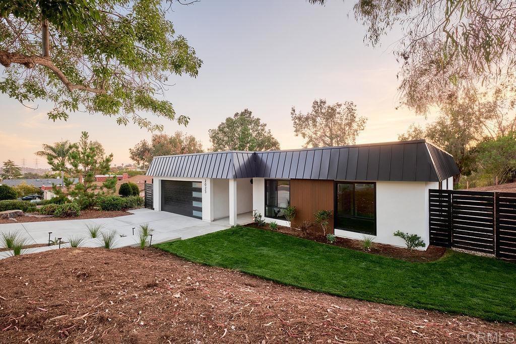 This isn’t just a new home. It’s a new chapter—designed with intention. Dwell West Homes presents a reimagined retreat in coveted Henie Hills, where every inch of this modern masterpiece has been thoughtfully transformed. More than just remodeled, this home has undergone a complete aesthetic revival—inside and out. A striking new façade sets the tone, enhanced by a sleek sheet metal roof and dramatic black-on-black double-pane windows. Inside, high-end designer finishes meet intelligent upgrades: La Cantina doors for seamless indoor-outdoor flow, a tankless water heater, a new HVAC system, and a kitchen worthy of a magazine spread—complete with waterfall-edge quartz counters and a stunning white oak island. The reconfigured primary suite offers serene golf course views and spa-inspired comfort. Entertain with ease from your custom-built-in bar, or unwind in the nearly half-acre backyard with raised garden beds and room to breathe. Refined yet relaxed, luxurious yet livable—this is North County living at its best, just minutes from the coast. See it before it’s gone.