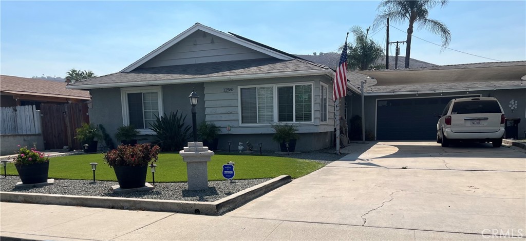 Welcome to this beautifully maintained 3-bedroom, 2-bath home nestled in the heart of western Riverside, not far from the Corona border. From the moment you step inside, you’ll be greeted by a bright and spacious formal living room—perfect for entertaining guests or relaxing in comfort. The separate family room offers a cozy retreat with a fireplace and flows seamlessly into the newer kitchen, complete with updated finishes, marble counters, custom backsplash and plenty of cabinet space for all your cooking needs.
Each bedroom features carpet and ceiling fans for added comfort, and both bathrooms have been tastefully updated with modern touches and feature quartz counters in the primary bathroom and and marble counters in the secondary bathroom. Whether you’re hosting a gathering or enjoying a quiet night in, this home offers the ideal blend of functionality and charm. Don’t miss the opportunity to make it yours!