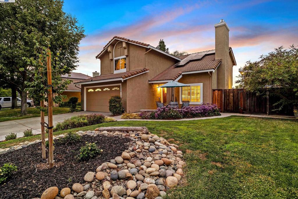 THE BEST LOCATION!! Nestled in one of Livermore’s most coveted neighborhoods, this home captivates and inspires you to live your best life! Step inside this thoughtfully updated home where design meets comfort. The newer kitchen is a culinary dream, featuring quartz countertops, stainless steel appliances, built-in storage, chic wine and coffee bar. The spacious family room boasts vaulted ceilings and abundant light. Upstairs you’ll find a beautiful primary bedroom with gorgeous on-suite bath and 3 more guest rooms. The expansive backyard offers a multitude of entertainment zones: dine al fresco under the gorgeous wood pergola, unwind by the cozy fire pit, play on the lush lawn, or get your garden growing in the raised beds alongside the chicken coup and storage shed. This fantastic property includes owned solar and a permitted 120 sqft fitness studio or office on the side yard. HOA includes access to a secluded community pool and front yard landscape maintenance. Just a stone’s throw from City Hall, Police Department, Livermore Library, and our vibrant downtown. Easy access to the Arroyo Mocho Trail, top-rated public and private schools, and award winning wineries! Experience the heart of Livermore!