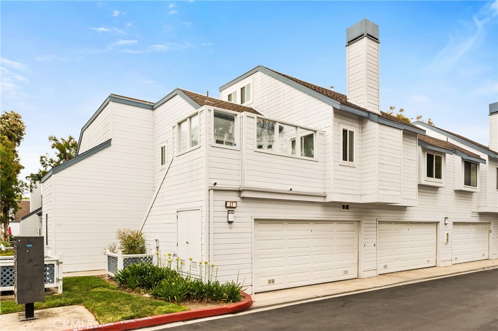 Luxurious end unit with a newer roof and exceptional upgrades throughout. The living room offers a soaring vaulted ceiling, a cozy fireplace, and a new vinyl slider that opens to a spacious patio deck—perfect for entertaining or relaxing. The gourmet kitchen showcases quartz countertops, a new subway tile backsplash, and quiet-close cabinet doors, along with a stainless steel refrigerator, microwave, sink, and newer range. A new stackable washer and dryer are conveniently located in the utility closet.
The generously sized primary bedroom features mirrored wardrobe doors and an ensuite dressing area with a quartz countertop and quiet-close cabinetry. A striking spiral staircase leads to an expansive loft, ideal as a second bedroom, home office, or flex space. New luxury vinyl flooring enhances both levels, providing easy maintenance and a modern touch.
Seller is related to the listing agent
Residents enjoy all the world-class amenities of Woodbridge, including two lakes with sailing and fishing, pools, picnic areas, lagoons, sandy beaches, parks, ball fields, bike trails, and walking paths—creating a resort-like lifestyle in one of Irvine’s most sought-after communities.
