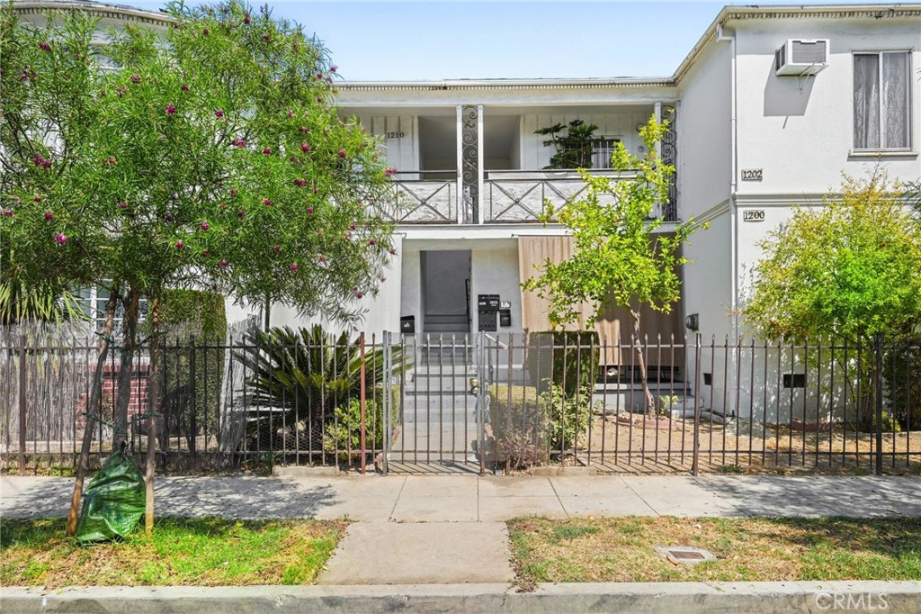 Welcome to 1200 N. Kenmore Ave, a well-maintained six-unit multifamily property situated on a desirable corner lot offering a prime investment opportunity in the heart of East Hollywood. This two-story gated building spans 5,128sqft. on a generous 7,000sqft. lot, featuring 2 - 2 bedrooms, 2 - 1 bedroom and 2 studios with 6 bathrooms in total.
All six units are currently leased to long-term tenants who pay on time and maintain their homes with care, making this a truly turnkey investment.
The property is in good condition with updated units, minimizing maintenance concerns for the next owner.
Additional highlights include garage and carport parking for up to 8 vehicles, a valuable amenity in this high demand urban neighborhood. Built in 1946, the property offers a solid structure with modernized interiors that support both stability and growth potential.
Ideally situated near schools, shops, restaurants, and just minutes from the Metro B Line, this property provides tenants with convenience and accessibility while offering investors steady cash flow and strong appreciation potential.
Perfect for investors seeking a turnkey, fully occupied property with dependable tenants and minimal headaches.
Don’t miss this rare opportunity to acquire a stable, income-producing property in one of Los Angeles’ most vibrant rental markets.
