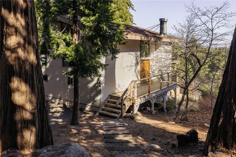 Photo of 859 Strawberry Peak Rd, Twin Peaks, CA 92391 (MLS # IG26035928)