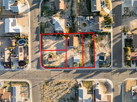 Photo of 620 Starlight St, Barstow, CA 92311 (MLS # HD26033943)