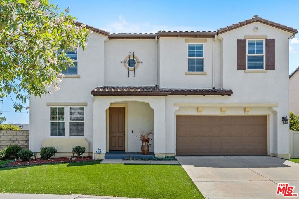 Exquisite Mediterranean-Style Home in Prestigious Chatsworth Welcome to this absolutely stunning 4-bedroom, 4-bathroom residence with a spacious loft, nestled in a serene and exclusive Chatsworth neighborhood on a quiet Cul-de-Sac. Built in 2007, this elegant Mediterranean-style home boasts an open-concept floor plan designed for both luxurious living and effortless entertaining.The gourmet kitchen is a chef's dream, featuring a generous granite island, sleek stainless-steel appliances, a walk-in pantry, and picturesque views of the beautifully landscaped backyard. The kitchen seamlessly flows into a grand family room adorned with a cozy fireplaceperfect for gatherings or quiet evenings at home.Enjoy the sophistication of a formal living room and dining area, complemented by a custom-designed staircase that leads to the expansive upstairs living quarters. The open loft offers versatile spaceideal as a fifth bedroom, home office, or media room.Retreat to the luxurious primary suite, complete with dual walk-in closets, double vanities, a spacious shower, and a spa-like soaking tub bathed in natural light. Upstairs, you'll also find an oversized laundry room with built-in cabinetry for added convenience, along with three additional bedrooms offering ample closet space and a well-appointed bathroom.Step outside to your private backyard oasis, featuring a large side yard, open patio, and low-maintenance artificial turf in all yard areasperfect for outdoor entertaining or peaceful relaxation.Additional highlights include direct access to a two-car garage and a prime location on a quiet cul-de-sac. This exceptional home is truly a must-see!
