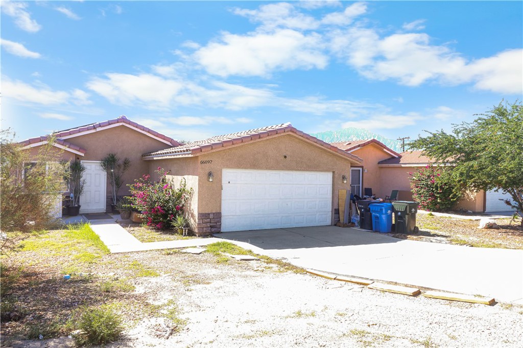 Discover your Desert Haven in Desert Hot Springs with this move-in-ready home!!! Own this 2006 Built Home that is so well planned so the entire family can live together with room to spare. With two master suites and three bedrooms , there is room for the entire family. This home features dramatic high ceilings, a patio off the dining area and another one off the master bedroom, dual pane windows, extra large closets, finished garage, a breakfast bar, an inside laundry, upgraded flooring to wood laminate with vinyl water-proof materials throughout the house and remodeled kitchen with quartz counters, self closing doors and drawers. Plenty of upside potential as this home features four bedrooms with two master bedrooms with their own full bathroom and the other two bedrooms share one full bathroom. The home features Central Air Conditioning and Heating. Lots of fruit trees at the right side of the home. Located one block to Edward Wenzlaff Elementary School, the Civic Center and the Park. This is a MUST SEE to appreciate!!!