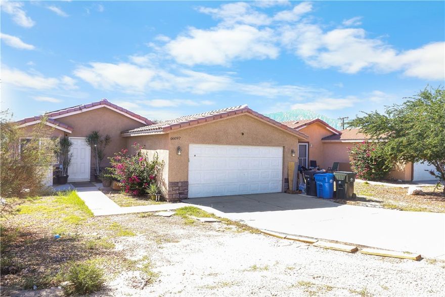 Discover your Desert Haven in Desert Hot Springs with this move-in-ready home!!! Own this 2006 Built Home that is so well planned so the entire family can live together with room to spare. With two master suites and three bedrooms , there is room for the entire family. This home features dramatic high ceilings, a patio off the dining area and another one off the master bedroom, dual pane windows, extra large closets, finished garage, a breakfast bar, an inside laundry, upgraded flooring to wood laminate with vinyl water-proof materials throughout the house and remodeled kitchen with quartz counters, self closing doors and drawers. Plenty of upside potential as this home features four bedrooms with two master bedrooms with their own full bathroom and the other two bedrooms share one full bathroom. The home features Central Air Conditioning and Heating. Lots of fruit trees at the right side of the home. Located one block to Edward Wenzlaff Elementary School, the Civic Center and the Park. This is a MUST SEE to appreciate!!!