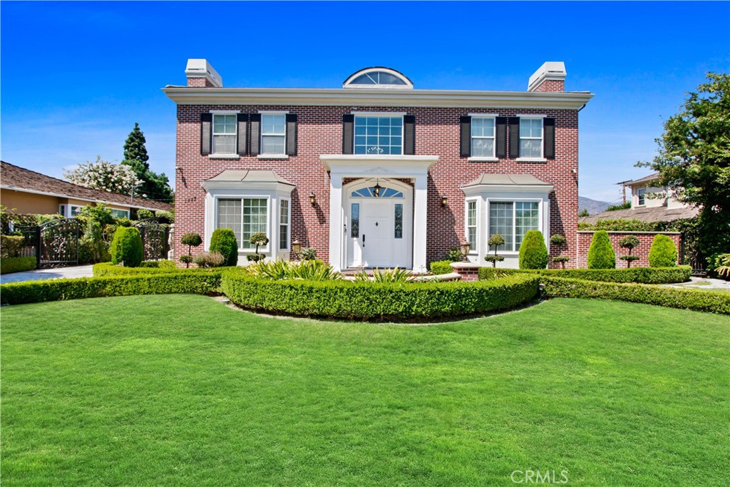 Completely rebuilt in 2008, this timeless Georgian Colonial inspired home is ready for its new residents. Starting with the foyer, you will be greeted with a magnificent chandelier, and a stenciled dome with a 20 feet or more high ceiling. To the right of the entrance is a sophisticated library office with custom built in cabinets and fireplace, perfect for any professionals working from home. On the left is a stunning living room to entertain friends, family, and guests. In the formal dinning room, French doors frame with a picture-perfect back drop for hosting dinner parties. The kitchen features a large marble center island, two food warmers drawers, a stainless-steel fridge and freezer, a six gas-range stove, a built-in microwave, and a double stacked oven. You will also find a second wok kitchen equipped with a six gas-range stove and sink where you can cook up a storm. Nearby is the family room where friends and family can unwind and enjoy each other’s company, along with a custom-built cabinets, a central AV console, and a full bar.
Wide staircase with art deco handrails leads to the second-floor master bedroom that contains an all-marble finish floor and walls, a custom-built double sink bathroom vanity, a walk in closet, a jacuzzi bath, a steam room, and a custom-built vanity dresser. Connected to the master bedroom is a his and her custom-built office with a balcony to view the San Gabriel mountains at your leisure.
The second floor also includes a full suite with its own bathroom, and two bedrooms with a shared bathroom equipped with a custom-built double sink bathroom vanity. In addition, there is a den with another custom-built cabinets for kids to do work, play games, or watch TV. Most importantly, this property includes an exceedingly rare lower level that is hard to find in Arcadia. This level includes a dance studio, an entertainment room, a game room, and a master suite equipped with a marble shower/steam room and custom-built in cabinets with beautifully stained color surface. The basement is also equipped with a bar, refrigerator and freezer. basement also includes a French-door doorway that leads to stairs to the side of the home.
Lastly, the house includes a three- car garage with additional parking outside for guests and family.