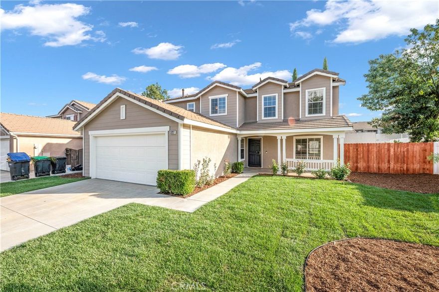 Step inside and fall in love with this light-filled, newly updated two-story home in the heart of West Hemet! Offering 3 bedrooms plus a spacious loft and 2.5 baths, this move-in-ready beauty features brand new LVP flooring throughout the main level, new carpet in all bedrooms, and fresh paint inside and out. The open-concept layout includes a large kitchen with ample cabinetry, a center island, and direct access to the backyard—perfect for entertaining. The family room features a cozy fireplace and tons of natural light. Upstairs, you’ll find a generous loft ideal for a game room, home office, or second living space. The primary suite offers dual sinks, a soaking tub, separate shower, and walk-in closet. Enjoy the newly landscaped front yard and a large, pool-sized backyard ready for your creative touch. Conveniently located near parks, schools, and shopping, with low taxes and no HOA—this Hemet gem has it all!