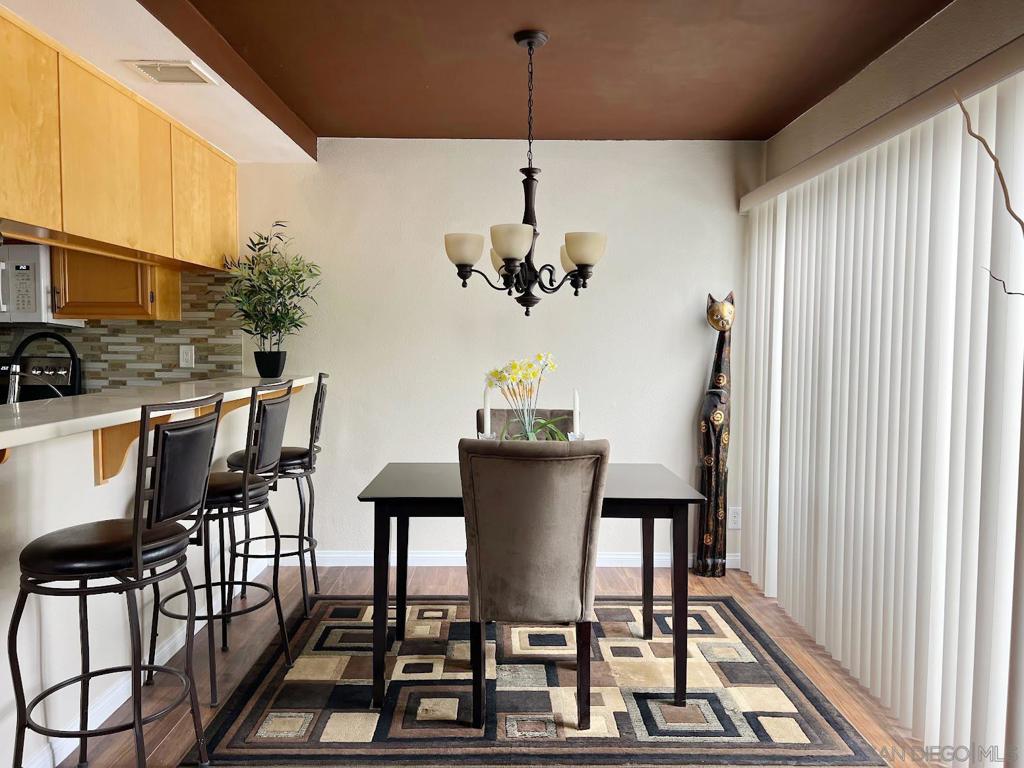 This spacious upstairs condo, offering over 800 sq. ft., has been fully remodeled and is situated in the highly desirable Bernardo Pines community. Upgrades include hardwood flooring, custom kitchen cabinetry, granite countertops, and a modern bathroom with Kohler fixtures and a jetted hydrotherapy tub. Featuring vaulted ceilings, full size washer and dryer, abundant natural light, and a generous walk-in closet, this one-bedroom, one-bath home feels bright, open, and inviting. From the expansive balcony and windows, enjoy serene views of the surrounding mountains and lush greenery. Bernardo Pines provides resort-style amenities, including swimming pools, Jacuzzis, a tennis court, and a clubhouse. HOA dues conveniently cover most utilities, making this home as practical as it is beautiful. Don’t miss this rare opportunity—schedule your showing today!