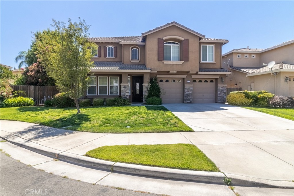 Beautiful 4-bedroom, 3.5-bath home in North Merced. This home boasts unique features, it has acacia wood floors, plantation shutters, custom window coverings, a Juliette balcony, built-in bookshelves, archways, and a loft with built-in shelves and bench seats, perfect for an office or family room. Home also features Cathedral ceilings and large windows for beautiful backyard views. The kitchen features floor-to-ceiling storage and a granite countertop island. The large, beautiful backyard includes raised garden beds, a brick patio, and a garden shed. Located on a large lot at the end of a cul-de-sac, this move-in-ready home awaits you.