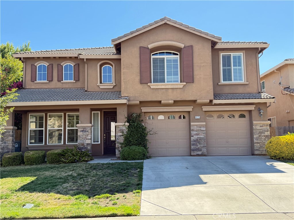 Beautiful 4-bedroom, 3.5-bath home in North Merced. This home boasts unique features, it has acacia wood floors, plantation shutters, custom window coverings, a Juliette balcony, built-in bookshelves, archways, and a loft with built-in shelves and bench seats, perfect for an office or family room. Home also features Cathedral ceilings and large windows for beautiful backyard views. The kitchen features floor-to-ceiling storage and a granite countertop island. The large, beautiful backyard includes raised garden beds, a brick patio, and a garden shed. Located on a large lot at the end of a cul-de-sac, this move-in-ready home awaits you.