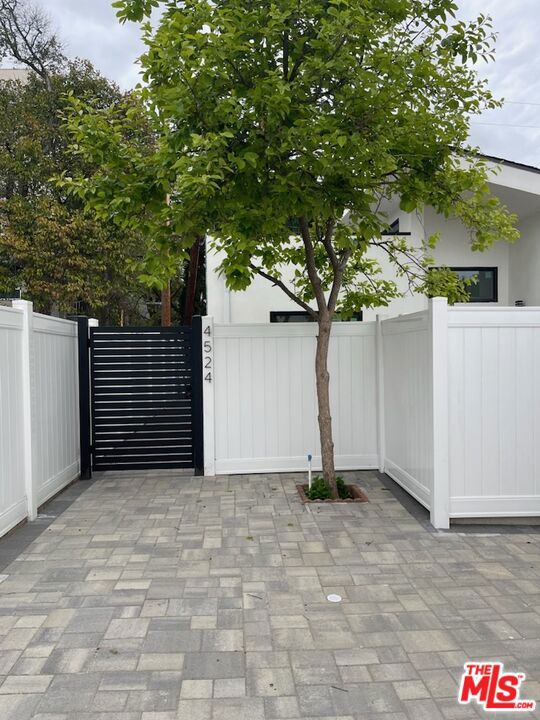 Stunning brand-new construction in Sherman Oaks. Charming Detached 2 bedrooms and 2 bathrooms for Rent Private & Fully Independent. Enjoy complete privacy in this beautifully detached unit. Features include:Private entrance with gated access. Enclosed front and back yards, perfect for outdoor living. Separate utilities and billing for total independence. Modern interior with full kitchen, bathroom, and living space. Ample parking on your own driveway. Ideal for anyone seeking a quiet, self-contained home-like experience while still being part of a well-maintained property.This modern home boasts designer finishes throughout, a sleek kitchen with all appliances included, hardwood flooring, central air, and a stylish modern fireplace. A solar power system adds energy efficiency. Located in a highly-rated school district and just minutes from Studio City, top shopping, dining, and major freeways.