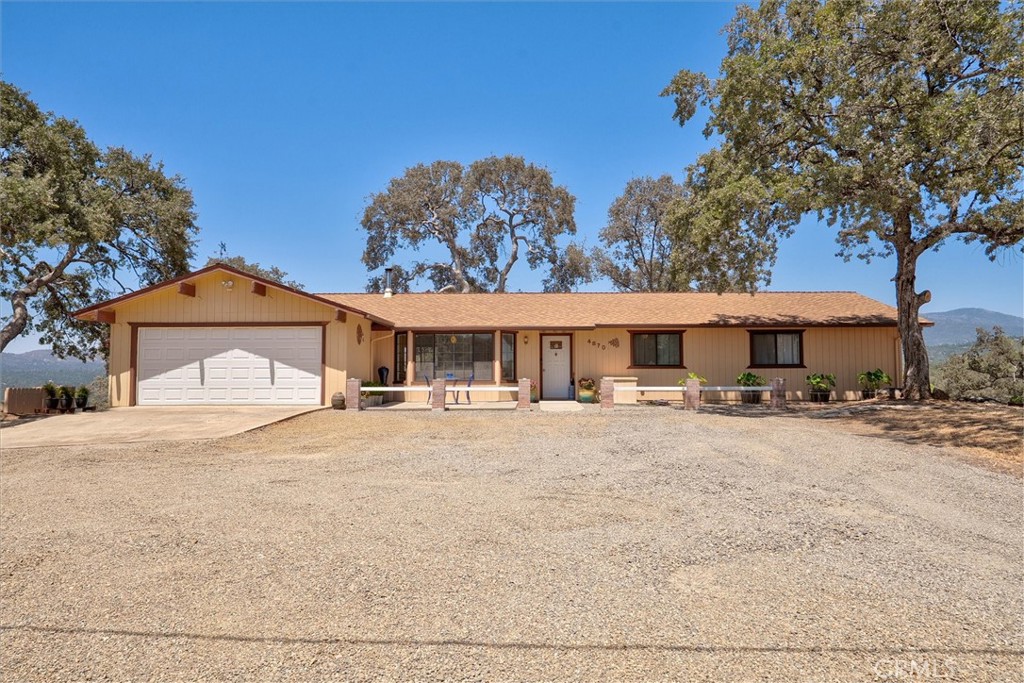 Unmatched Views & Impeccable Pride of Ownership!
Wake up every day to sweeping views from this beautifully maintained 3-bedroom, 2-bath home set on 5.5 acres in Mariposa, the gateway to Yosemite National Park. Large dining room windows and a spacious concrete patio perfectly frame the surrounding scenery, making it ideal for relaxing or entertaining.
Step inside to discover new luxury vinyl plank flooring running seamlessly throughout the entire home, adding warmth and continuity to every room. The inviting living room features a charming bay window, while the kitchen shines with sleek granite countertops. The main suite offers two closets and a bathroom finished with granite counters for a touch of elegance.
Thoughtfully designed for comfort and versatility, this property includes central heat and air, a finished garage, an additional detached shop/garage, carport, multiple outbuildings, and an RV hookup. The grounds are clean, brushed, and beautifully maintained, reflecting true pride of ownership inside and out.
Move right in and start enjoying the peaceful Mariposa lifestyle, incredible views, and easy access to the wonders of Yosemite National Park!