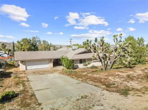 Photo of 56620 Hidden Gold Drive Dr, Yucca Valley, CA 92284 (MLS # PW26059247)