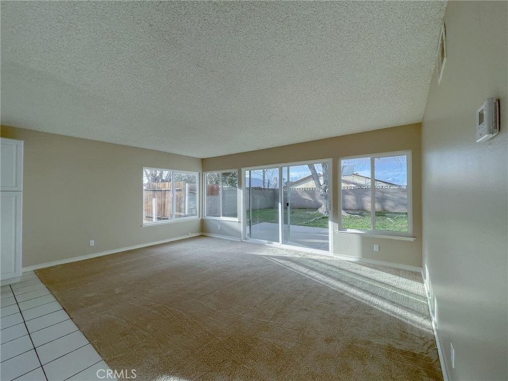 Photo of 823 E Kildare Street, Lancaster, CA 93535 (MLS # SR25244210)