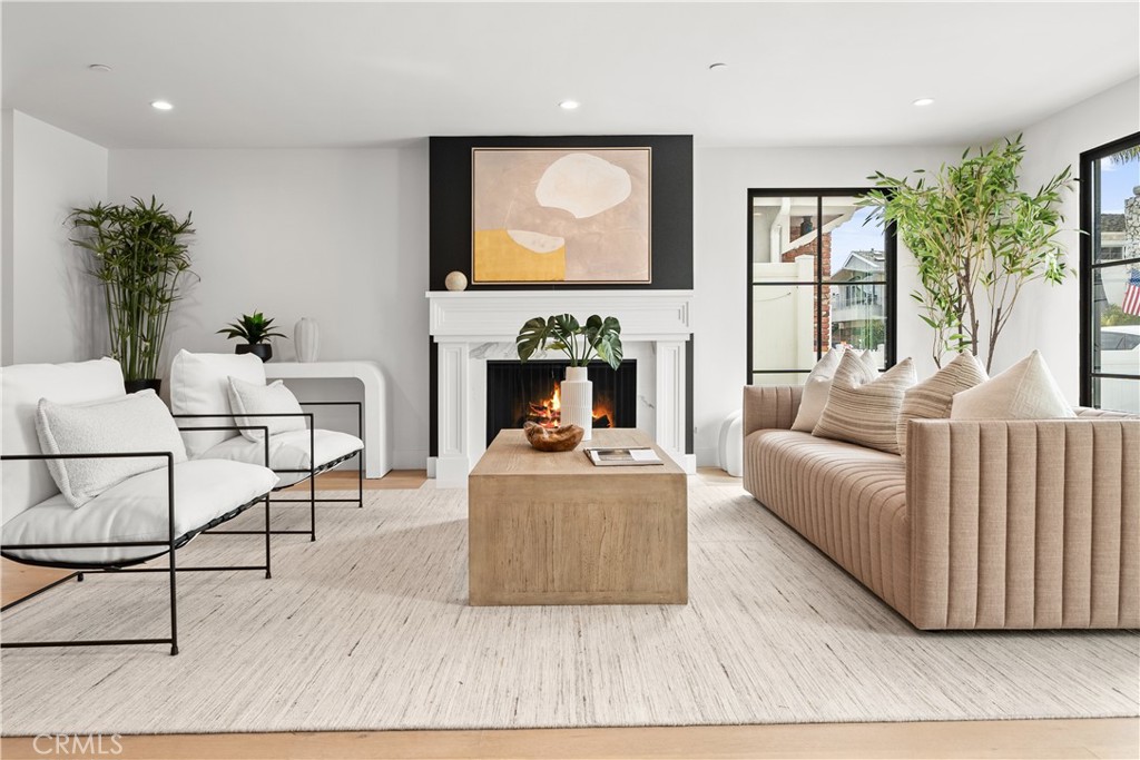 Welcome to 214 Abalone Avenue, a rare find on the highly sought-after Little Balboa, offering the perfect blend of modern luxury and coastal charm. This stunning fully remodeled residence is designed for elegant living with high-end finishes and custom pieces throughout. Enjoy the tranquility of Little Balboa Island, a quiet and exclusive enclave just minutes from the additional charm of Balboa Island. Stroll to the nearby beaches, local cafés, boutique shops, and world-class waterfront dining. Come see the thoughtfully crafted floor plan complete with an ADU—ideal for guests, rental income, or a private retreat. No detail was overlooked in this top-to-bottom renovation, featuring a brand-new gourmet kitchen with custom cabinetry, quartz countertops, custom wood doors, a handmade custom fireplace, high-end stainless-steel appliances, and an oversized island. The open-concept design flows seamlessly into the dining and living areas, highlighted by large windows that bathe the home in natural light. This stunning home boasts an expansive living area with its custom finishes creates a warm yet sophisticated ambiance. The private ADU contains a detached 1-bedroom, 1-bathroom offering ample space, a private entrance, and full amenities.
From its prime location on the exclusive Little Balboa to its luxurious updates and versatile ADU, 214 Abalone Avenue is a true Newport Beach gem. Whether you’re looking for a full-time residence, a vacation retreat, or an investment opportunity, this home has it all.
Don’t miss this rare opportunity to own a slice of paradise!