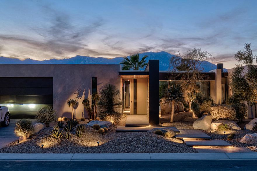 An architectural study in volume, light, and material, designed by Sean Lockyer AIA, principal architect at Studio AR&D. Steel-beam construction frames expansive interiors where masonry walls and organic finishes meet mountain views and the desert horizon. Living spaces flow seamlessly to a transformed outdoor environment: an upgraded zero-edge pool and spa, water feature, and meticulously designed lighting and landscaping by Stoker Pools. The primary suite is a study in quiet luxury, anchored by a freestanding travertine tub carved from a single block. Floor-to-ceiling Fleetwood sliders, Gucci and Phillip Jeffries wall coverings, and California Closets throughout bring precision and clarity to every detail. An open gazebo has been transformed into a full casita, currently configured as the pool cabana, but is perfectly suitable for an office or fourth bedroom suite. Every element is intentional--Control4 home automation, butler's pantry, and custom finishes combine function with art. Renowned for its privacy and quiet prestige, Rancho Mirage has long been a preferred refuge for Presidents, business leaders and Hollywood elite.  This property is truly unmatched in vision and execution, and beyond anything offered in today's new construction market.  Shown by appointment.