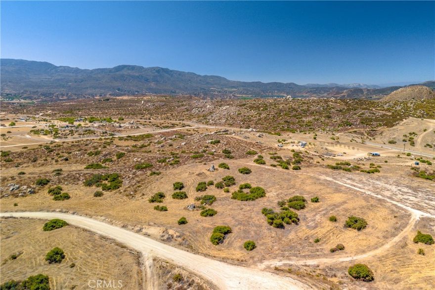 Beautiful 4.81 acre parcel located in quiet private rural community. 360 degrees of view perfect to build your own oasis. Only 15 minutes from Temecula.