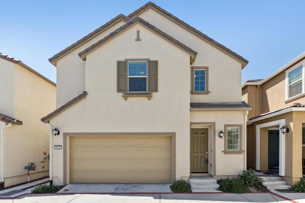 Welcome to this inviting 3-bedroom, 2-bathroom home located in the vibrant city of Elk Grove. Spanning 1,815 square feet, this residence offers a blend of comfort and functionality. The kitchen is a culinary enthusiast's dream, featuring a gas cooktop, granite countertops, an island with sink, and modern appliances including a dishwasher, microwave, and refrigerator. The kitchen seamlessly flows into the family room, providing an ideal space for gatherings. The home is equipped with central AC for year-round comfort, and features amenities such as vaulted ceilings and a walk-in closet in the primary suite. The bathrooms are well-appointed with double sinks, granite surfaces, and luxurious options like an oversized tub with jets and a stall shower. Flooring consists of both carpet and laminate, offering a cozy and practical environment. The home also includes an inside laundry area for convenience. Located within the Elk Grove Elementary School District, this property is an excellent choice for those seeking a comfortable and well-equipped home.