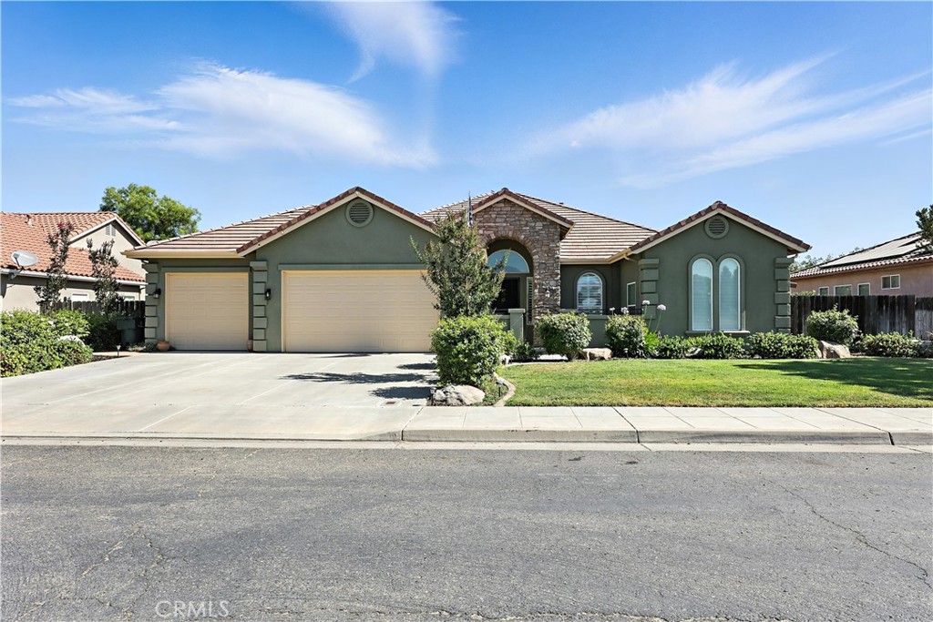 Discover this lovely 3-bedroom, 2.5 bath home nestled in a peaceful neighborhood that offers the feel of a gated community -- without the HOA fees! Thoughtfully designed with some custom touches throughout, this home combines comfort and character in a serene setting. The beautiful, covered patio, is perfect for outdoor relaxation year-round with a built-in fireplace and wired for your big screen TV, you won't want to leave. This home is a must see!