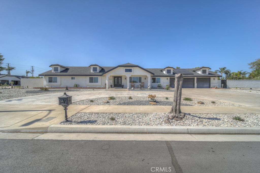 Sprawling Ontario Retreat with Modern Charm & Income Potential---ADU HOME
Welcome to 1220 Tropicana Street, a beautifully reimagined custom home in the heart of Ontario, CA. Set on a spacious 0.42-acre lot, this stunning single-story residence boasts 5 bedrooms, 4 bathrooms, nearly 3,000 sq ft of living space.
From the moment you arrive, the home's striking curb appeal, fresh exterior, and drought-tolerant landscaping set the tone for what awaits inside. Step through the front door and be greeted by soaring vaulted ceilings with exposed beams, luxury vinyl plank flooring, and an airy open-concept layout that seamlessly connects the living, dining, and kitchen areas.
The chef-inspired kitchen features crisp white shaker cabinetry, sleek quartz countertops, stainless steel appliances, a large center island, and abundant space for gatherings. The adjacent great room with its charming fireplace and oversized dining area makes entertaining a breeze.
Retreat to the private primary suite, complete with an updated en-suite bath, while four additional bedrooms offer flexibility for guests, a home office, or creative space. The permitted ADU includes its own kitchen, bathroom, and laundry area—ideal for multigenerational living or generating extra income.
Outdoors, the expansive backyard is a blank canvas for your dream outdoor oasis, already zoned for horses and offering ample room for entertaining or recreation. Unwind year-round in your private outdoor spa, Enjoy sustainable living with solar panels that reduce utility costs.
With modern upgrades, energy efficiency, and versatile living spaces, this home is truly one-of-a-kind in the Ontario market.
Don’t miss your chance to own a rare combination of style, space, and functionality.