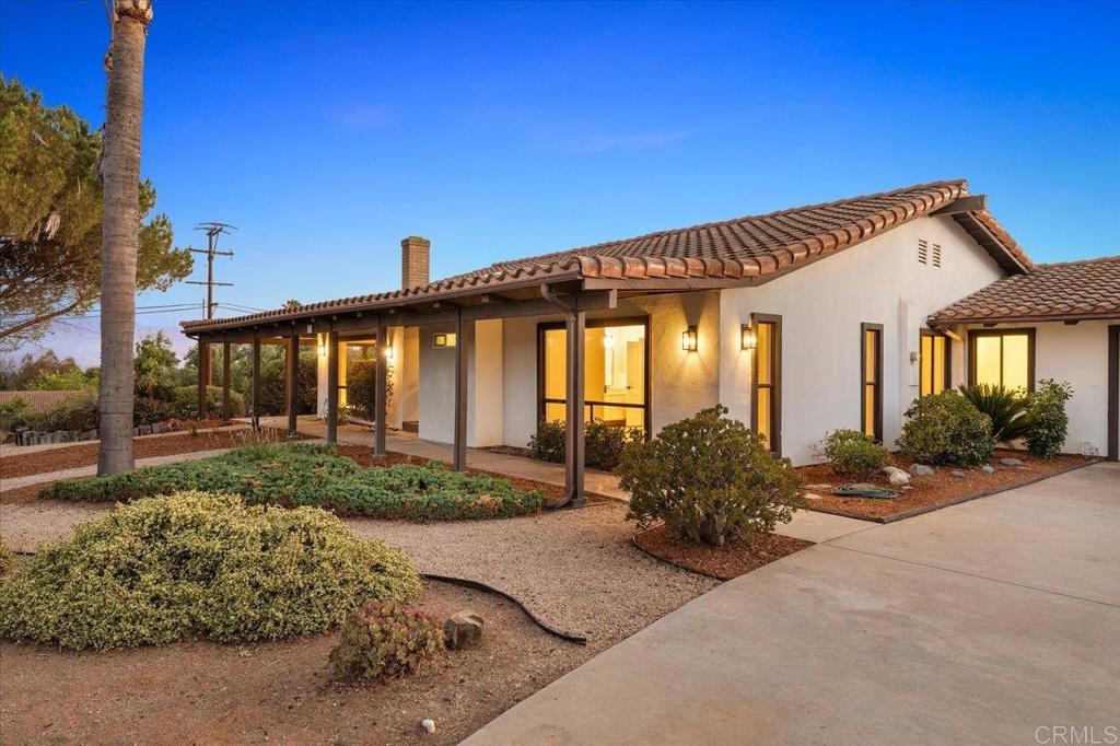 Welcome to 112 Palmas Norte - a slice of heaven in the heart of Fallbrook. Come experience country living with the convenience of being close to town while still having the major freeways just minutes away. This 3 bedroom, 2.5 bathroom home has just gone through a renovation and is move-in ready for you! Situated on a 1.24 acre lot, you have room to grow, to play or to just enjoy the peace and quiet of nature. 2,191 sq ft of open living space that features vaulted, beamed ceilings, a new kitchen and primary bathroom, new flooring and paint throughout. There is also a small office/workspace in the back yard that could be perfect for an in-home office, a workout room, tool shed or whatever your needs may be. 3 car garage for all your vehicles and toys and more. Property has a side gate on the back half of the property, making it convenient for RV parking if desired.