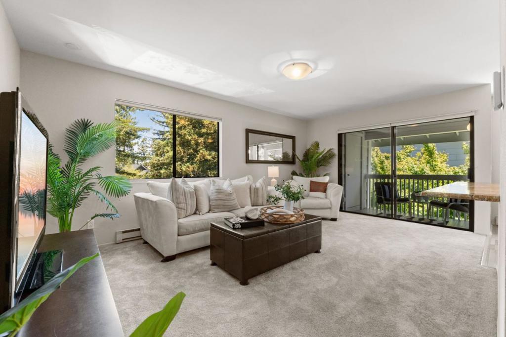 Tucked into the serene Oak Park community on the Los Altos border, this inviting top floor end-unit offers a rare blend of privacy, natural beauty, and unbeatable convenience. Surrounded by majestic redwoods and lush landscaping, it is a peaceful retreat just moments from the vibrant downtowns of Mountain View and Los Altos. The remodeled kitchen flows into both the spacious living area and dining space, and has island seating for an added casual feel. The private balcony, in-unit laundry, sun tunnels in the bathroom and kitchen and energy efficient lighting all add to the warmth and welcome of this home. The bedrooms are a generous size and the walk in closet in the primary suite adds everyday ease. Located on the ground level below the unit is a finished designated 1 car garage with additional locking storage or parking flexibility. Oak Park residents enjoy beautifully maintained grounds, wide open lawn areas, a sparkling pool, community garden, and a welcoming clubhouse. Located near top-rated schools, Caltrain, VTA, and major tech campuses with Whole Foods, San Antonio Center, and countless local favorites just minutes awaythis location checks every box for Silicon Valley living.