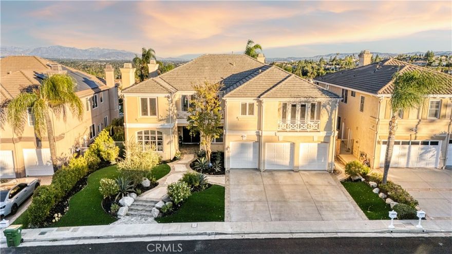 Welcome to the exquisite 7612 Carmenita Lane in West Hills, CA 91304, a luxurious estate nestled in the prestigious Stonegate. This panoramic view property is ideally situated on a prime cul-de-sac street, offering unparalleled elegance and comfort.

As you step inside, you're greeted by sophisticated white oak wood floors throughout, featuring a stunning herringbone pattern at the entryway and living room. The modern glass stair railings and LED lights under the stairs create a warm and inviting ambiance. The home boasts a spacious and convenient layout, with high volume ceilings and light-filled rooms, including two staircases, five XL bedroom suites each with its own bathroom, a den/office with a fireplace, and a large bonus room on the second level.

Elegant upgrades enhance the beauty of the interior, including recessed LED lighting throughout, four upgraded fireplaces with a double-sided fireplace in the lavish master suite, and a newly added media room for entertainment. The master suite is a true retreat, offering breathtaking views, a sumptuous bathroom, a large closet, and a view balcony.

The family room features a wet bar with a large granite counter, perfect for hosting gatherings. The spacious kitchen with ample cabinet storage and a large dining area, along with a formal dining room, cater to all your culinary needs. Outside, the low-maintenance yard boasts upgraded pool and spa equipment and upgraded landscaping – all overlooking the amazing panoramic view.

Ideally located close to parks, temples, highly desirable schools, and shopping, this estate offers both privacy and convenience. Experience the pinnacle of elegance and comfort at 7612 Carmenita Lane, where every detail has been carefully considered to create a truly magnificent home.