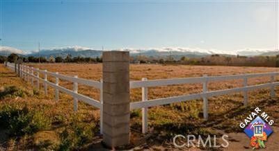 Prime Location Horse Property - Ready to Build, Very private horse property in heart of west Palmdale area with customs homes.
Fantastic opportunity to own approximately 2.25 acres in a desirable location with close by paved Street on Ave N and dirt road access on 25th St W. Surrounded by other homes, this rare ''white fence'' property is completely fenced and ready for your dream custom home, equestrian setup, or future investment. All utilities are available at the street. Don't miss out—this lot is priced to sell fast!