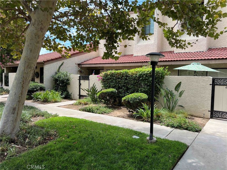 This exceptional townhouse, situated in the highly sought-after Encino Village community, offers 3 Bedrooms & 2.5 Bathrooms. Located in the quiet side of the complex, near one of the pools areas, but distanced enough for a serene living experience. Private patio entry, welcomes you into the first living space with a beautiful fireplace, sliding door & high ceilings to combine indoor/outdoor living. A few steps up lead to an all-integrated modern style recently remodeled dinning-kitchen-family area. The gourmet kitchen is a chef's delight, top-of-the-line stainless steel appliances, new custom cabinetry and sleek quartz countertops. Kitchen and Family Room area with recessed lighting throughout and plantation shutters, an oversize isle also with quartz countertop perfect to enjoy meals or entertain guests, wet bar and a guest bathroom. The property has wood floors throughout. On the upper floor, there is a large master bedroom with a high ceiling, wall to wall closets and a recently remodeled master bathroom. Additionally, there are two more bedrooms that share another bathroom. Two private attached garage w/direct access to the townhouse, plus a washer & dryer & plenty of room for storage. The community itself offers fantastic amenities, including two swimming pools, two spas, two racquetball courts, a club house, sauna and fitness equipment all set in a beautifully landscaped, park-like environment on over 5 acres, and generous amounts of visitor parking make this a wonderful place to call home.

Prime location, walking or biking distance to the Metro station. Located on the border between Encino and Tarzana, Encino Village enjoys the convenience of being near Pierce College, Lake Balboa Recreation, Highway 101, the dog park at White Oak & Victory and many shopping and dining opportunities along Ventura Blvd.

This home checks ALL of your boxes for quiet and private living, offering you everything you can ask for in a fantastic, quiet community. Schedule a private tour today, this exceptional opportunity will not last!