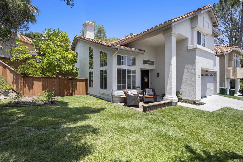 Beautiful and private Promenade 2 story home. Extra large lot on a cul de sac street. Nice an quite and peacefully placed. There is a producing pecan tree, a producing avocado tree along with a producing blackberry patch. This home has 3 bedrooms AND an office loft. A well thought out remodeled kitchen with deep rich wooded cabinets and granite counters offer excellent working and prep space. The main living level is naturally light filled and very welcoming. There are new 4 inch baseboards and new laminate flooring thought out this level. The interior of this home is freshly painted. Also newly installed is a light and neutral carpeting up the stairs and into the bedrooms. The primary bedroom suite is very generous with a sitting area and walk in closet. The primary bathroom has two deep rich wood cabinets which is repeated throughout the home. There are dual vanities, a soaking tub and walk in shower. Again very light filled and soothing. The two guest bedrooms share a hall bathroom and an ample amount of linen storage is in the hall. Both bedrooms have deep closets and light built ins. The front yard is very large for the community and offers room to play and host parties. The community is friendly centric. The Promenade has it's own heated swimming pool and BBQ's for it's residence and offers community gatherings, children's play area and a small dog park. This home is so conveniently located close to shopping, schools, stores and highways. Very friendly and a great walking neighborhood.