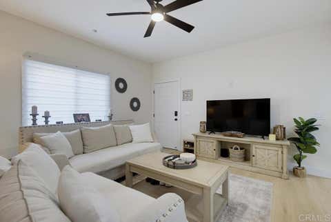 Photo of 9728 Marilla Dr Dr #106, Lakeside, CA 92040 (MLS # PTP2606390)