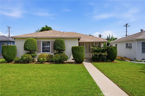 Photo of 12752 Cowley Ave, Downey, CA 90242 (MLS # CV26077574)