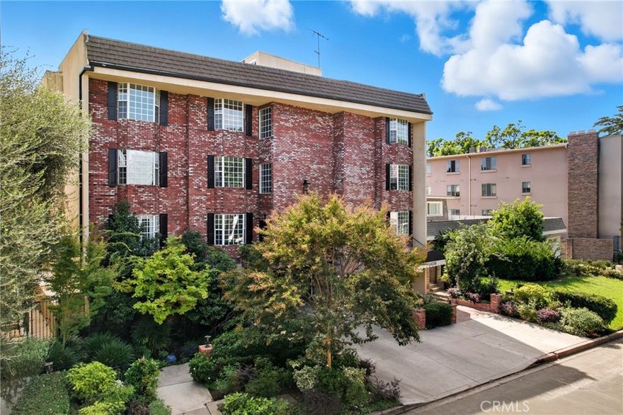 Modern Sherman Oaks Condo with Stunning Valley Views. Welcome to this beautifully updated 2-bedroom, 2-bath condo in the heart of Sherman Oaks, offering picturesque views over tree-lined streets and stretching all the way across the Valley to the Santa Susana Mountains. With an open-concept layout and sunlight pouring into every room, this home perfectly blends comfort, style, and convenience. The remodeled kitchen is a standout, featuring custom cabinetry, granite countertops and backsplash, built-in seating, stainless steel appliances, a gas range, and refrigerator. Hardwood floors run throughout the unit, accented by recessed lighting, plantation shutters, and charming bay windows. The spacious living room boasts a cozy marble fireplace, perfect for relaxing evenings. The primary suite offers a walk-in closet and a remodeled en-suite bathroom with a custom dual-sink vanity, granite countertop, and a fully tiled shower. The secondary bedroom features a large closet and easy access to another stylishly upgraded full bath. Additional highlights include central air and heat, two reserved spaces in the gated underground garage already wired for EV charging in your own space. Community amenities include a pool, spa, and fitness room. All of this is just a block from Ventura Boulevard's best dining, shopping, and entertainment, including Bacari, Schatzi’s, The Local Peasant, Mendocino Farms, and Ralphs. Quick access to the 101 and 405 freeways and top-rated schools like The Buckley School make this a rare find in one of the Valley's most desirable neighborhoods.