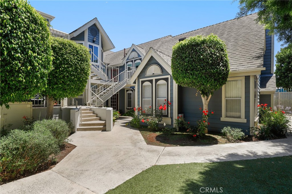Move-in ready 2 bed, 2 bath home is ready to be made yours! Located in the desirable Knowleton Manor, gated community in the South Coast Metro neighborhood features an open floor plan with cathedral ceilings, tile flooring, in-unit laundry, 3 private balconies, and 2 garage parking spaces in the gated underground parking structure! The kitchen has been updated with gorgeous wood cabinetry, granite countertops, and offers stainless steel appliances including a gas range, microwave, and dishwasher. The kitchen has a breakfast nook as well as bar seating area and opens to the spacious living room with fireplace and sliding glass door to one of the private balconies. This home has two primary suites, each with sliding glass doors to private balconies, walk-in closets, and private ensuites. The main primary suite features a bonus upstairs loft area with built-in shelving - the perfect space for an office, and the ensuite has dual sinks! Both bedrooms offer lots of privacy, sitting on either end of the home, and separated by the bathrooms and the laundry room. Sitting in an excellent location towards the back of the community and also conveniently located near schools, shopping, dining, as well as near South Coast Plaza, John Wayne Airport, OC Fairgrounds, The Pacific Amphitheater, OCC, Upper Newport Bay Nature Preserve, as well as Huntington Beach, the 73, 55, 405 Fwys, and all that OC has to offer! Schedule your private tour today!