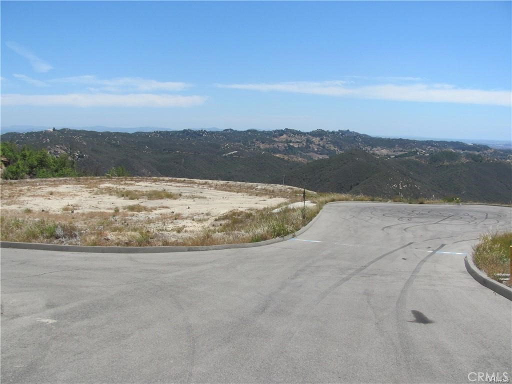 Seller financing available.Amazing near10-acre previously an avocado grove with irrigation lines and service grove paths still in place , is an excellent home site in prestigious area of De Luz with one of the best panoramic view . Property situated on a paved cul-de-sac leading to the large engineered building pad that includes a fire hydrant, and views that go to the coast and San Diego County. This is truly a property that must be visited to be appreciated. Short drive to old town Temecula and Fallbrook. This property is located within large custom estates and has underground power to the cul-d-sac, and a 1" water meter in to the property. Come build your Dream Home.
