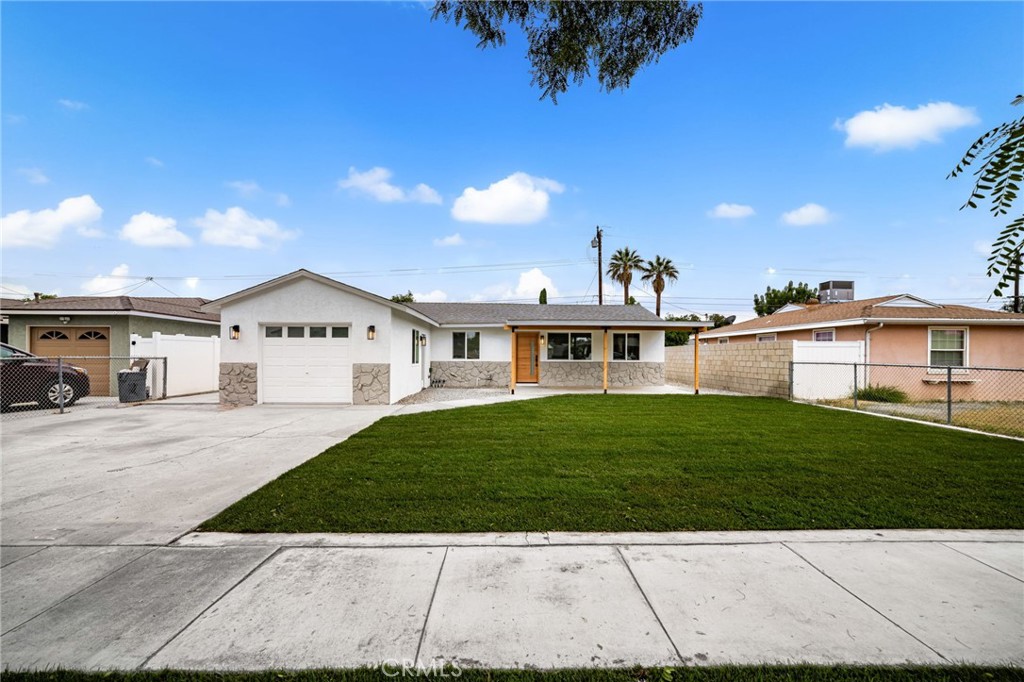 A fully renovated single story gem in the heart of Fullerton. This 4 bedroom, 2 bathroom home offers 1,473 square feet of modern living space. Inside, you'll find a completely remodeled interior featuring new luxury vinyl waterproof plank flooring, recessed lighting, brand new dual-pane windows, new paint throughout interior and exterior of home, new HVAC system which runs throughout house and garage making it a usuable area for an at home office or gym area. The kitchen has been beautifully redone with oak-toned cabinetry, quartz countertops, and an oversized island layout rarely found in homes this size. Both bathrooms have been remodeled with stylish finishes. Major upgrades include a brand-new roof, updated plumbing, updated electrical, New 200 AMP panel, and endless upgrades. Outside, enjoy a generously sized covered front porch, or a backyard with plenty of room to entertain with new landscape. With its thoughtful layout, quality upgrades, and prime location near parks, schools, and shopping, this move-in ready property is waiting to welcome its next owners.