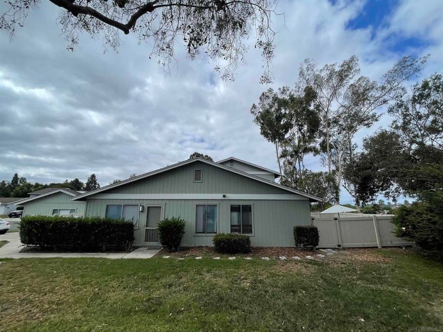 Single level end unit in Village Park with 3 bedrooms and 2 full bathrooms, and over 1014 sq. ft of living space. Family room, dining room and full size kitchen. Home features two gated patios, laundry room, a 1 car garage and driveway to park two cars.