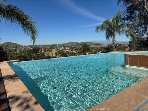 Photo of 30861 Blackhorse Drive, Canyon Lake, CA 92587 (MLS # SW26044659)