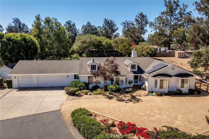 Welcome to 760 Black Oak Lane. This home offers a rare opportunity to enjoy land, privacy, and a beautifully updated horse property all in one.

Perched at the end of a cul-de-sac on a private road, this newly remodeled single-level home features 3 bedrooms, 2.5 bathrooms, and a 3-car garage on a versatile ~one-acre lot. Vaulted ceilings, natural light, and real wood floors create an inviting, open layout, enhanced by plantation shutters throughout.



The gourmet kitchen serves as the heart of the home, designed for both entertaining and everyday living. It showcases two large center islands—one with barstool seating, providing generous counter space and added storage. Elegant granite counters pair beautifully with a marble subway tile backsplash, warm white custom cabinetry, soft-close drawers, and a Wolf range. Recessed lighting adds a modern touch, and a picture window overlooking the backyard completes the space.



The private primary suite offers a spacious retreat, featuring a walk-in closet and a fully updated en suite bathroom with a soaking tub, walk-in shower, and dual-sink vanity with modern finishes. Two additional bedrooms include bay windows and large closets, while the updated hall bathroom features a tub-shower combination and new dual-sink vanity with a gorgeous countertop. A conveniently located half bath sits just off the kitchen, and a separate laundry room offers direct access to the backyard and garage.



Step outside to your personal oasis, perfect for relaxing, entertaining, or enjoying the outdoors. The expansive backyard features a large grassy area, a garden space, and multiple gathering areas. An outdoor kitchen, cozy fire pit with seating, and a tranquil koi pond with a cascading waterfall set the scene for year-round enjoyment.

Bring your horses, chickens, RV, and toys—there’s room for it all. The property includes covered RV parking, a fully fenced yard, pasture with a stall, a tack shed, and a custom 11’ x 11’ tool shed with space to add a workshop, ADU, pool, or even expand the home; the possibilities are endless.



Meticulously maintained and move-in ready, 760 Black Oak Lane blends modern comfort with country charm—offering the rare balance of privacy, practicality, and style.