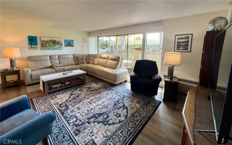 Photo of 254 Calle Aragon #B, Laguna Woods, CA 92637 (MLS # OC26172339)
