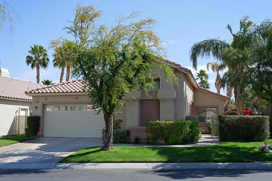 Don't miss out on this 3 bedroom, 3 bath family home in Indian Springs Golf & Country Club!! This home is located on a small quaint cul-de-sac and consists of 1,989 SF of living space and ready for immediate move-in! Popular Manhattan floor plan with wide open great room with built-in bar with wine fridge, fireplace, spacious kitchen, guest casita with private entrance, private master suite with walk-in closet. Spacious rear yard with covered patio and view of the 4th fairway of Big Rock Golf Course and plenty of room for a pool. Located within the Imperial Irrigation District for lower energy costs, close to all shopping and within the highly sought after Desert Sands Unified School District. Low HOA fees include front yard landscape maintenance, 24 hour guarded security, upgraded cable TV/internet and community pool, spa and fitness center. All of this within close proximity to La Quinta & Hwy 111, a reasonably priced golf club and Big Rock Pub!