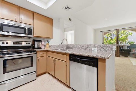 Photo of 680 Camino De La Reina #2201, San Diego, CA 92108 (MLS # PTP2606190)