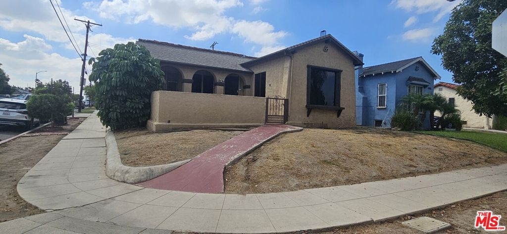 INVESTORS THIS IS IT! Spanish-style 3 bedroom, 1 3/4 bath home with over 1,500 sq. ft. on a 5,576 corner lot, offering outstanding potential to add an ADU. A FANTASTIC OPPORTUNITY also exists for an FHA 203K buyer to create their dream home. With fully remodeled homes in the area selling between $750,000 and $799,000, this property comes WITH BUILT-IN EQUITY. The step-down living room features dramatic high, beamed cathedral-vaulted ceilings and a fireplace. The full bath has been tastefully remodeled. Formal dining room, breakfast area, granite countertops, dishwasher, and laundry area with washer/dryer hookups are all in place. This home has great bones but needs updating. A new roof is required, along with additional repairs. The garage and attached living space area also in need of repair. Due to condition, this property will not qualify for regular financing. Property Sold As-Is.
