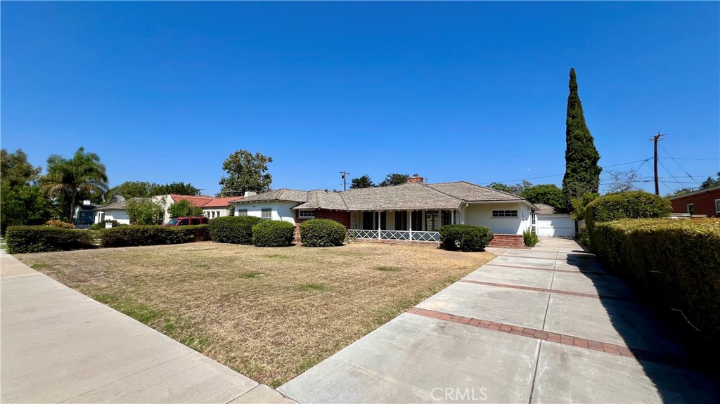 Welcome to 2309 Oakmont Ave., located on a quiet tree lined cul-de-sac in the sought after Park Santiago neighborhood of Santa Ana. This home was originally purchased decades ago from the original owner, who was a contractor that built this home for himself & also built homes in the immediate area (per seller, but not verified by agent) and is now being sold by the estate of the second owners. Oakmont is a unique tree lined street in Park Santiago because it appears to be the only street with a tree and street light lined center median that gives it a unique and special neighborhood appeal. This home was built on a lot just over 1/4 acre and is on record as a 2 bedroom 2 bath, but it was used as a 3 bedroom 2 bath while the current Seller grew up here. You’ll appreciate the open floor plan, double sided fire place with original stone, original double hung windows, large wall of windows between the family room and dining room that allows tons of natural light to pour in, copper plumbing, and hardwood floors under carpet. While this home is dated and needs some attention, with a vision it has massive potential to become your dream home! Just minutes away from the 22, 55, and 5 freeways. Equally close to shopping, dining, Santiago Park, only approx. 14 miles to Newport Beach, and less than 7 miles to Disneyland! Get in touch with your agent today to schedule a showing.