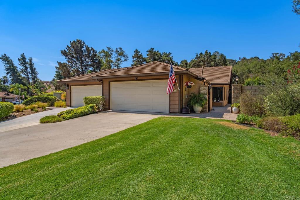This outstanding move-in-ready home sits on one of the largest and most private locations in the sought-after Pala Mesa Fairway Villas community. Remodeled from top to bottom with exquisite attention to detail both inside and out, the home offers two bedrooms, with the potential for a third bedroom/den/office, along with two full bathrooms. The beautifully designed kitchen has quartz countertops, custom cabinetry, Bosch and Kitchen Aid appliances, along with specialty details like under-cabinet LED lighting. Each bathroom has been remodeled with the highest-quality fixtures and fittings, and beautiful wood-grain tile that runs throughout the entire home. There is a Murphy bed for guests and a full-size washer and dryer inside the home, making everyday living a breeze. From the large indoor living area, French doors open onto the expansive outdoor patio, complete with custom pavers, a natural gas fire pit, LED landscape lighting, and a lush green lawn. Your private retreat! Just to add a cherry (or a few) on top, this home includes a solar system with a backup battery, new HVAC system, new stucco and paint, new water heater, new windows, and new attic insulation to complete the home.