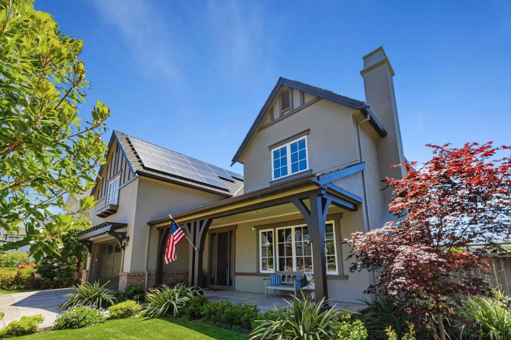 Welcome to this meticulously crafted home that seamlessly blends timeless Craftsman architecture with sophisticated designer finishes throughout. From hand-hewn woodwork and custom millwork to stone surfaces and designer lighting, every detail has been thoughtfully curated to offer warmth, elegance, and lasting quality. Expansive windows frame dramatic, unobstructed vistas of the golf course and tranquil water feature, creating an ever-changing backdrop from nearly every room. The open-concept living spaces are ideal for entertaining, with high ceilings, rich hardwood floors, and a seamless indoor-outdoor flow that invites you to relax and recharge in luxury. Thoughtful modern upgrades enhance the homes comfort and sustainability, including state-of-the-art solar panels paired with Tesla backup battery storage ensuring energy efficiency and peace of mind year-round. The luxurious primary suite features a spa-inspired bath and a spacious his-and-hers walk-in closets, offering both elegance and exceptional functionality. Located just moments from the Ritz-Carlton and scenic coastal trails, yet tucked within the privacy and security of Ocean Colony, this is truly a once-in-a-lifetime opportunity to live where elegance meets the ocean.