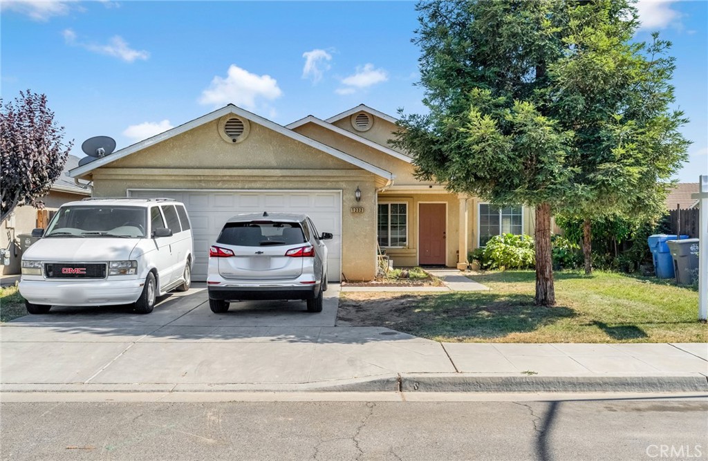 Welcome to 1232 Oso Drive, located in East Madera, built in 2007 and conveniently situated near local schools. This 3-bedroom, 2-bathroom residence offers just under 1,500 sq. ft. of comfortable living space with an open and inviting floor plan.
Enter into the spacious living room featuring tall ceilings and durable laminate flooring, perfect for relaxing or entertaining. The kitchen and dining area offer tile flooring, a gas stove, pantry for extra storage, and easy access to the backyard—ideal for gatherings or outdoor enjoyment.
With a functional layout, move-in ready condition, and a great location, this home is a must-see. Schedule your private showing today!